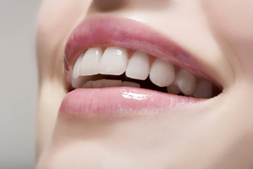 Close-up healthy smile representing cosmetic and smile designing services